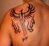 tribal phoenix tattoos on back